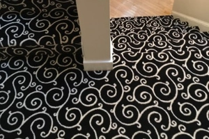 black carpet with white swirls